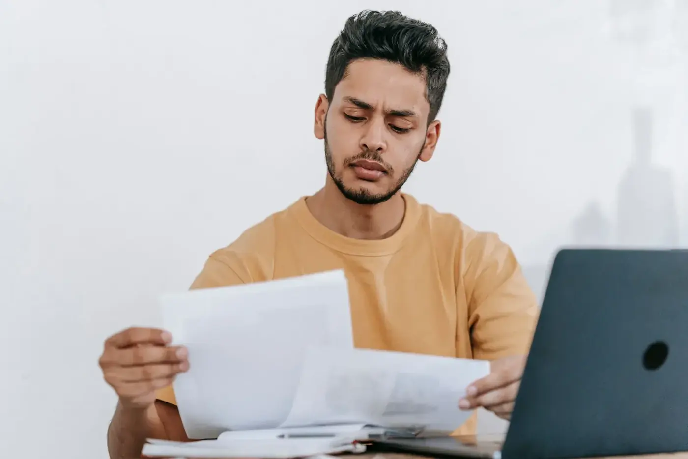 A bilingual analyst checking a set of results against the file