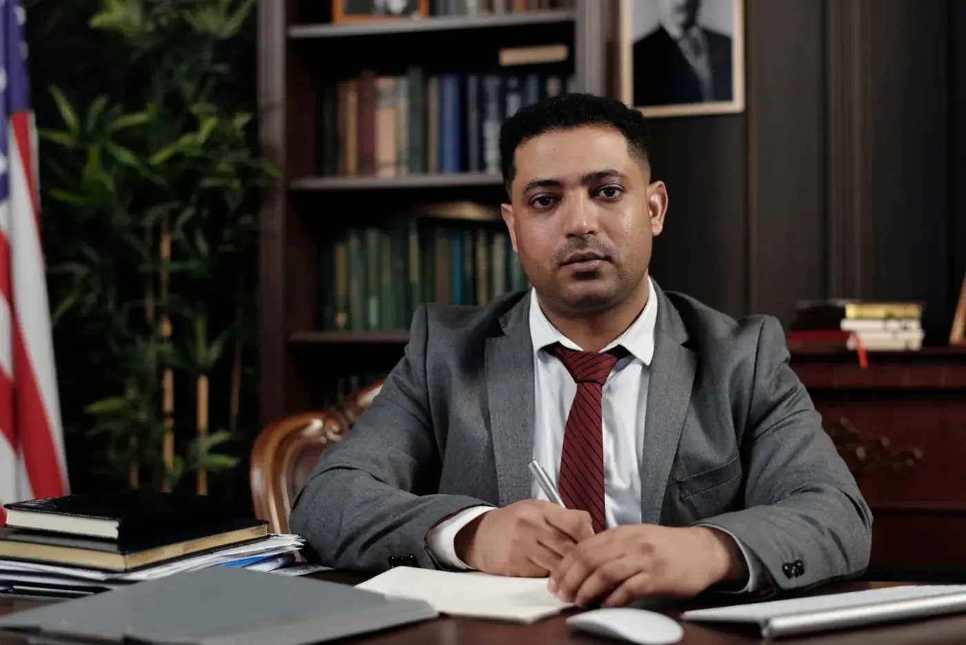A data entry professional working through records at his desk